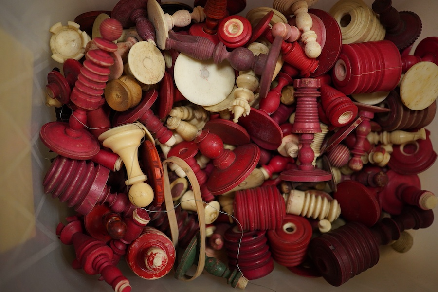 A collection of assorted stained bone chess pieces